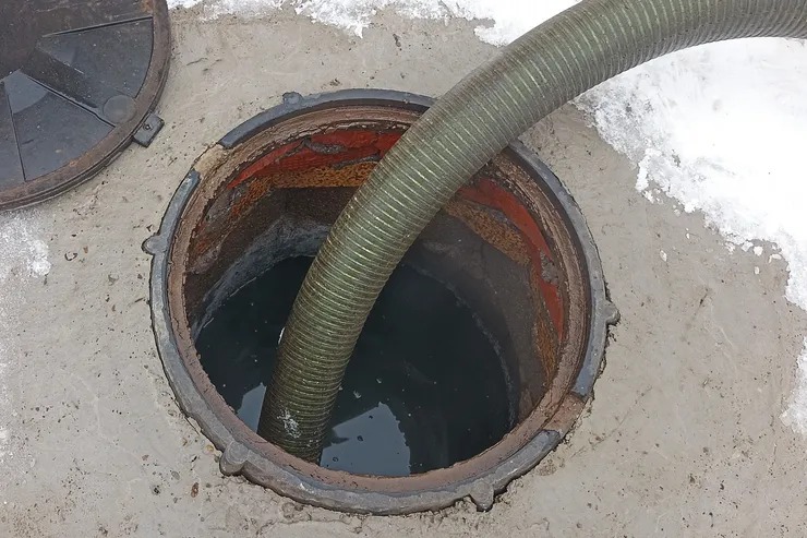 Excavated drain field being repaired on a residential septic system