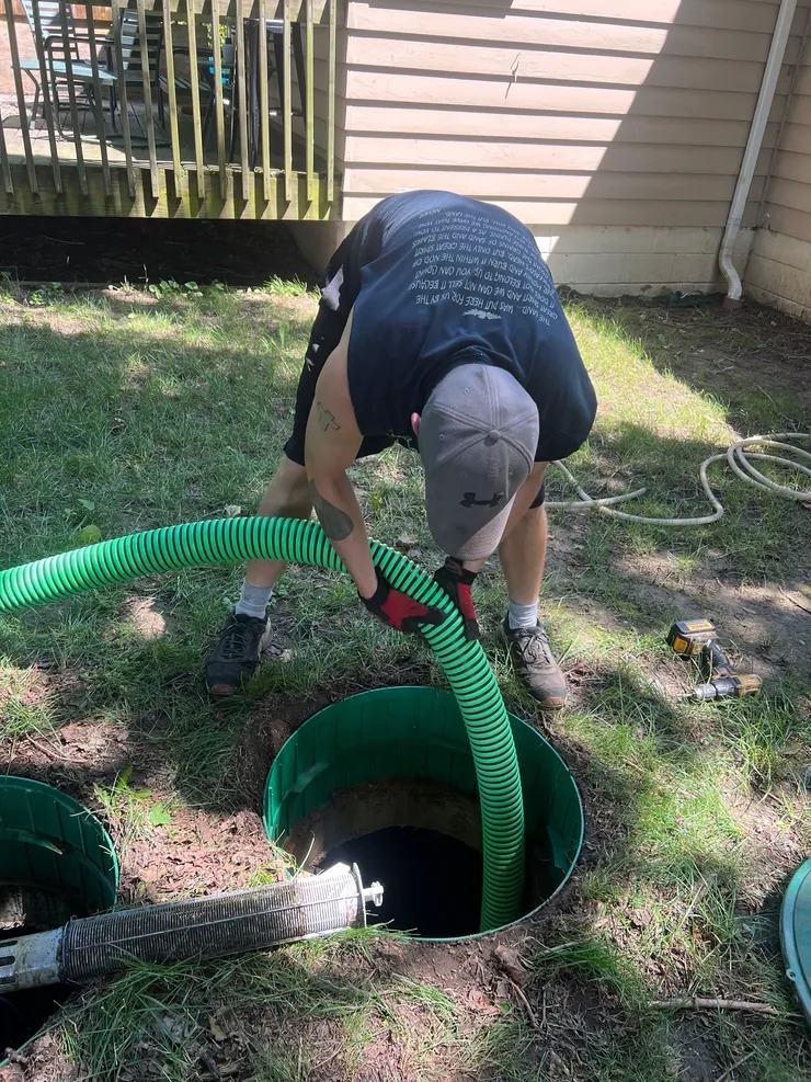 Excavation and grading work on site for a septic system installation
